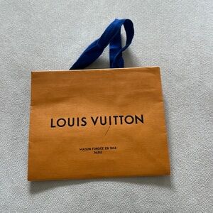 100% authentic Louis Vuitton shopping bag